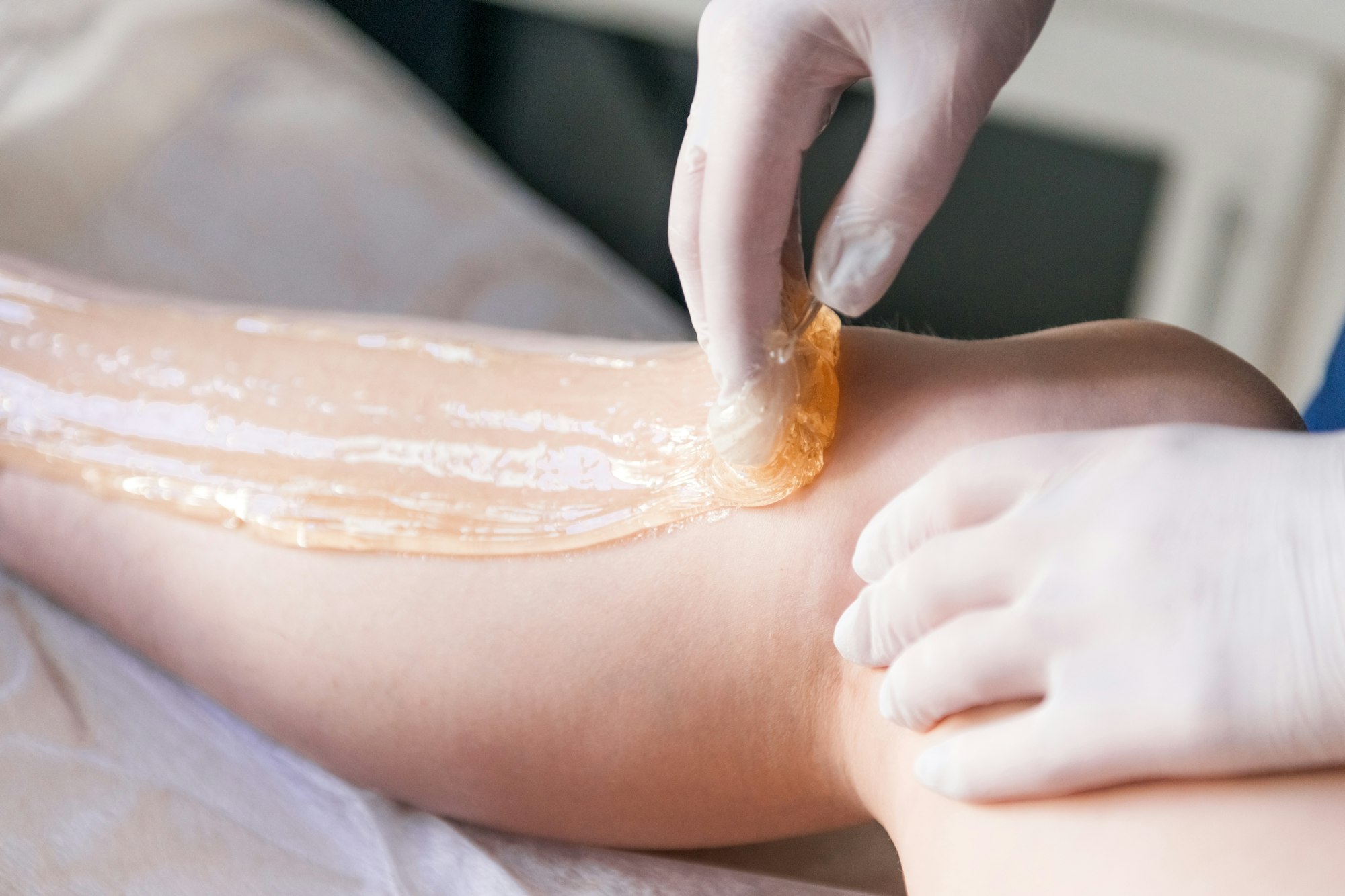 Professional waxing depilation procedure